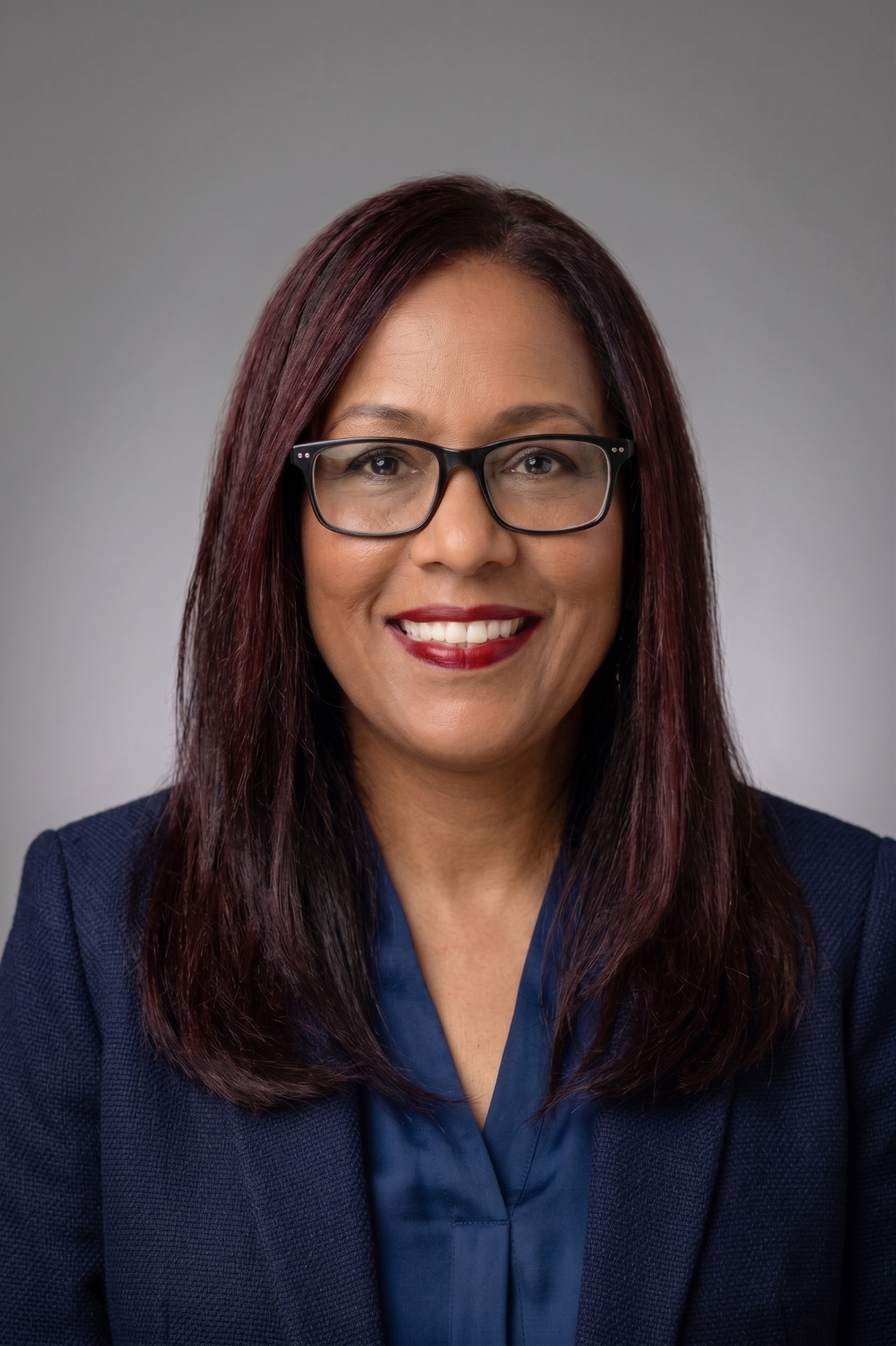 Portrait of Izola Garcia, MBA, MA, BSc